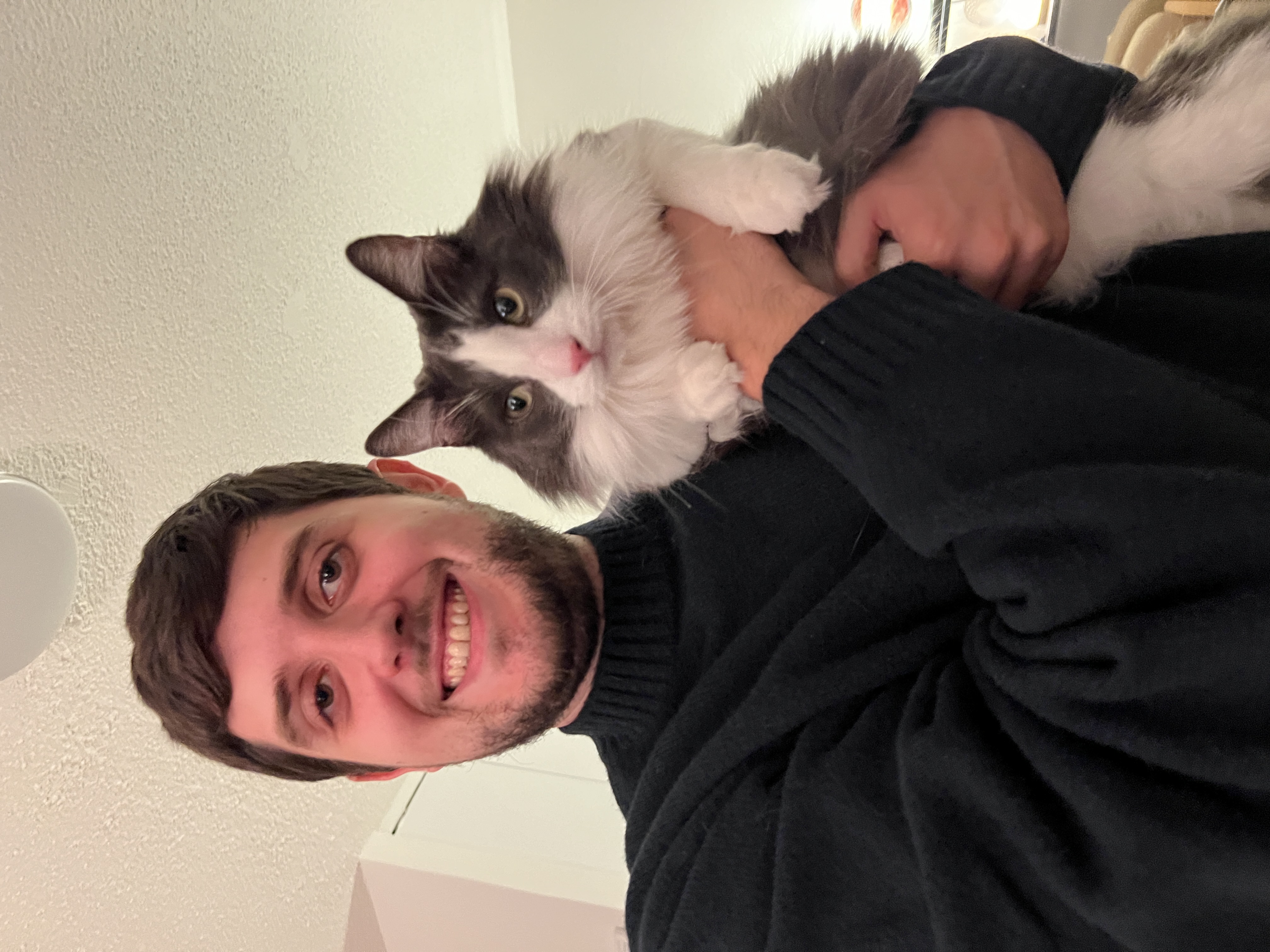 Bob held by his longtime friend, Simon